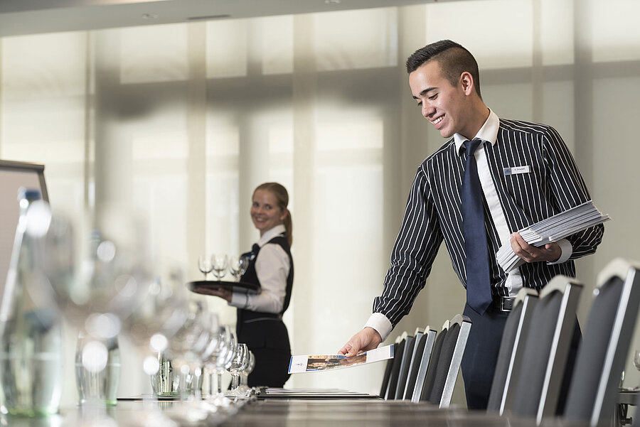 Maritim Conference Service Friendly service team at Maritim Hotel Bad Homburg preparing conference room.