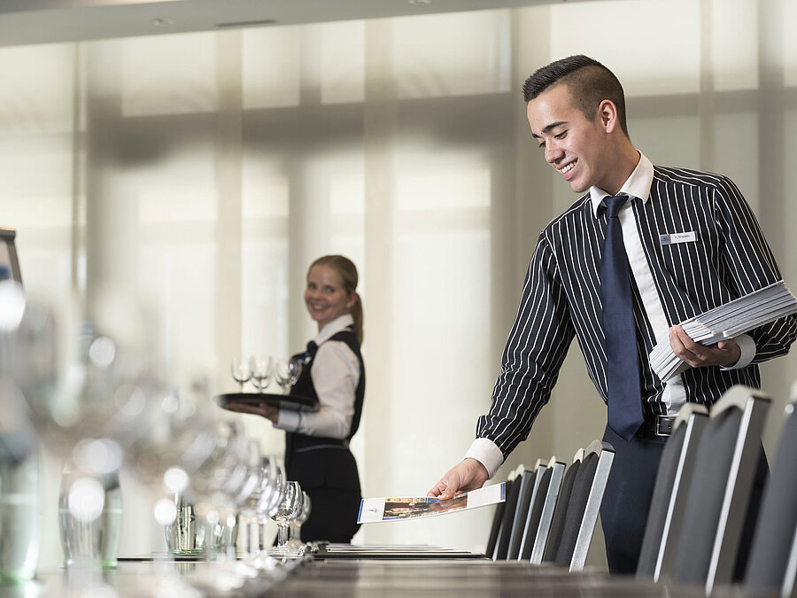 Maritim Conference Service Friendly service team at Maritim Hotel Bad Homburg preparing conference room.