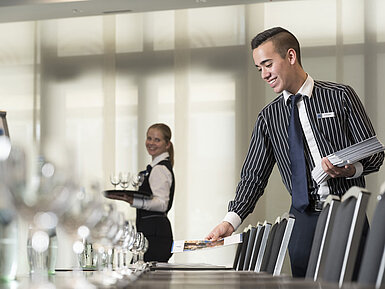 Maritim Conference Service Friendly service team at Maritim Hotel Bad Homburg preparing conference room.