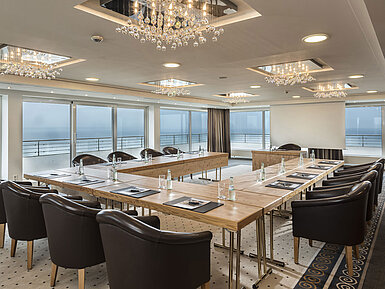 Salon Hamburg Salon Hamburg at Maritim Seehotel Timmendorfer Strand, conference room with sea view, L-shaped table, and elegant lighting.