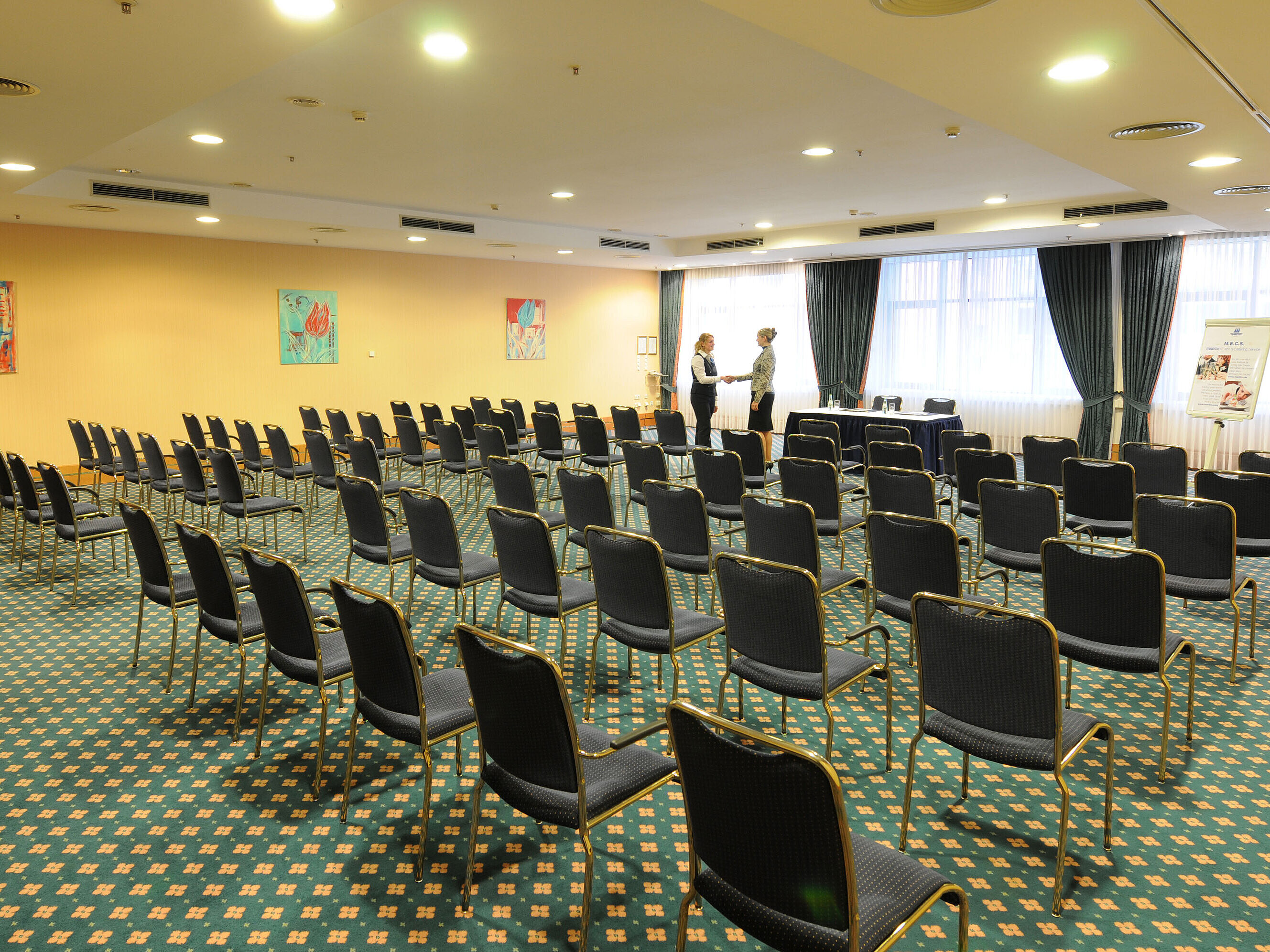 Salon München Large conference room with row seating and professional setup at Maritim Hotel Magdeburg.