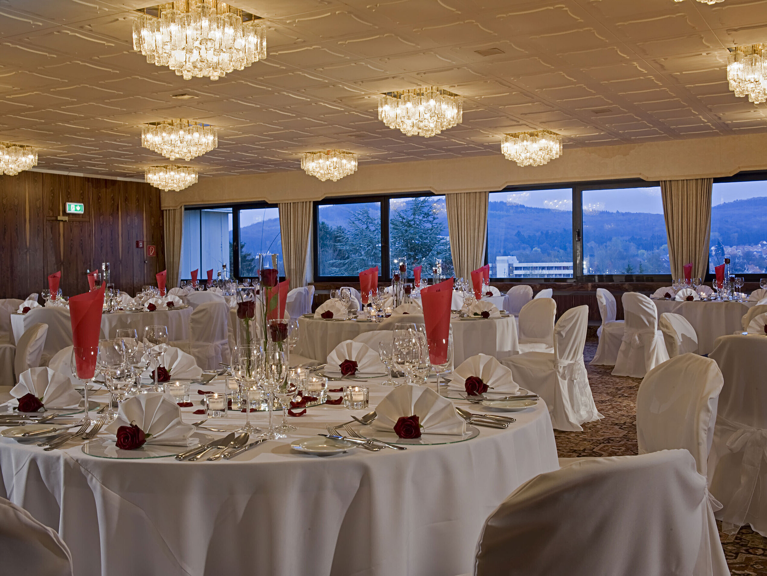 Dachgarten Spacious banquet hall with round tables and elegant decor at Maritim Hotel Bad Salzuflen