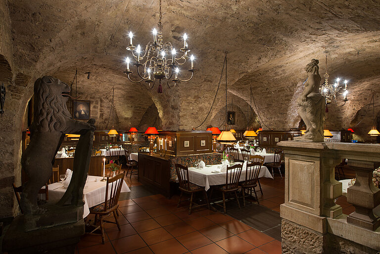 Dianakeller Restaurant Historic restaurant at Maritim Hotel Fulda with vaulted ceiling, candlelight, and rustic ambiance.