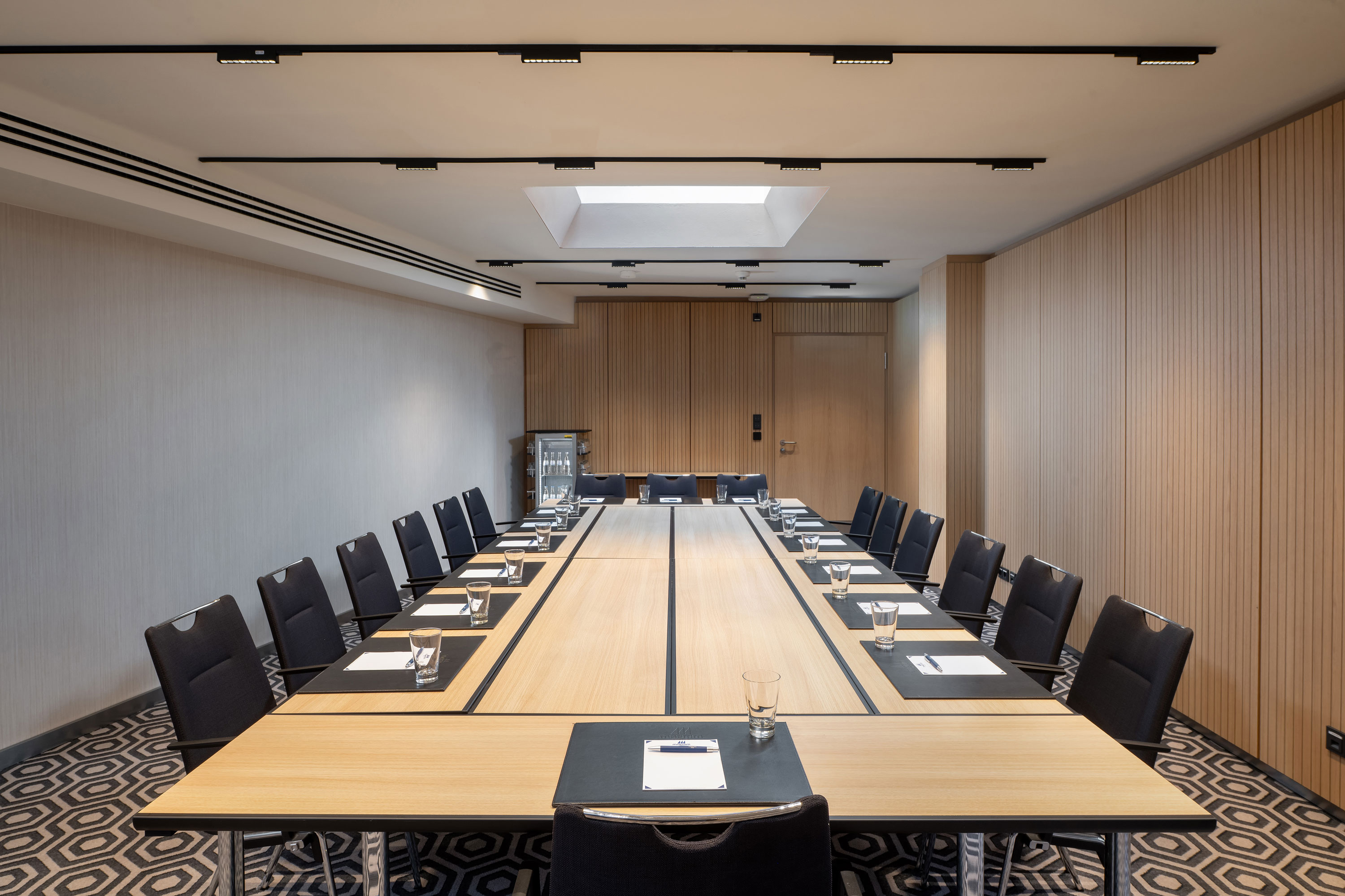 Meeting room 2 Meeting room 2 with U-shaped seating, conference tables, modern technology and a calm, professional atmosphere.