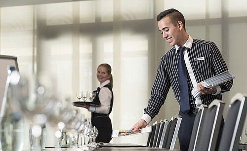 Maritim Conference Service Friendly service team at Maritim Hotel Bad Homburg preparing conference room.