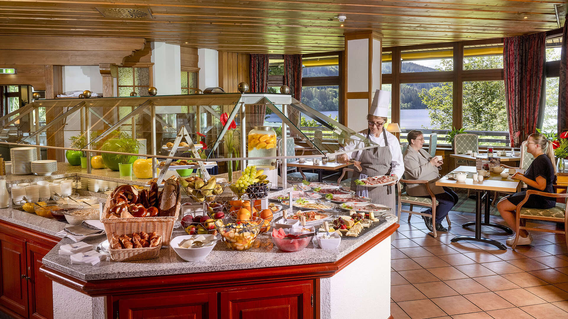 Breakfast Generous breakfast buffet with lake view at the Maritim Hotel Titisee