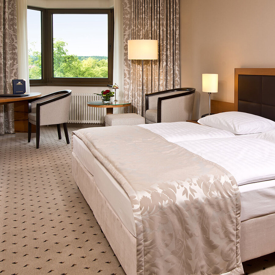 Superior room Comfortable hotel room at Maritim Hotel Bad Homburg with modern design and green view.